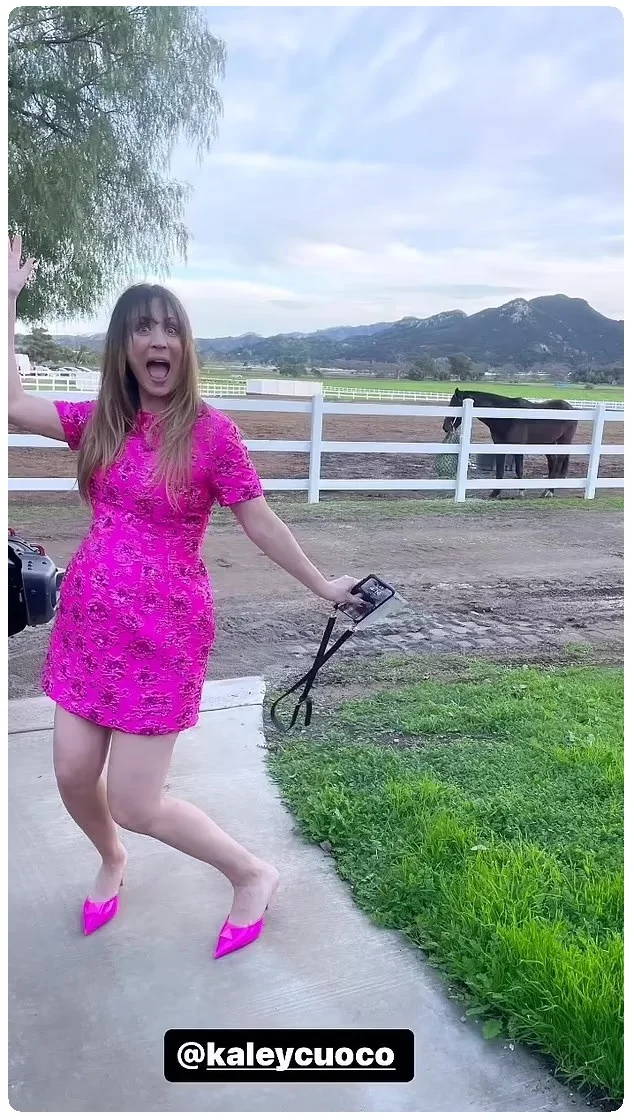 All pink: Kaley teamed her dress pink dress with matching pink shoes as she celebrated her baby girl on what appeared to be a horse ranch