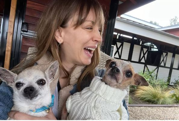 Kaley Cuoco Happy with Her Dogs